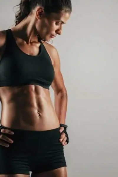 Toning Up at Home: The Ultimate Guide to Bodyweight Exercises 2 Image of woman's toned stomach after bodyweight exercises Sandwich and non-surgical treatment from Lipo 360